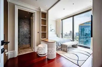 Luxurious bedroom with stunning city view and elegant decor