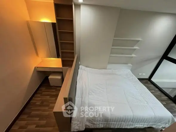 Modern bedroom with sleek design and cozy ambiance