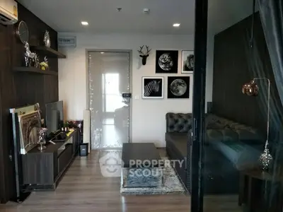 Stylish modern living room with chic decor and cozy seating area.