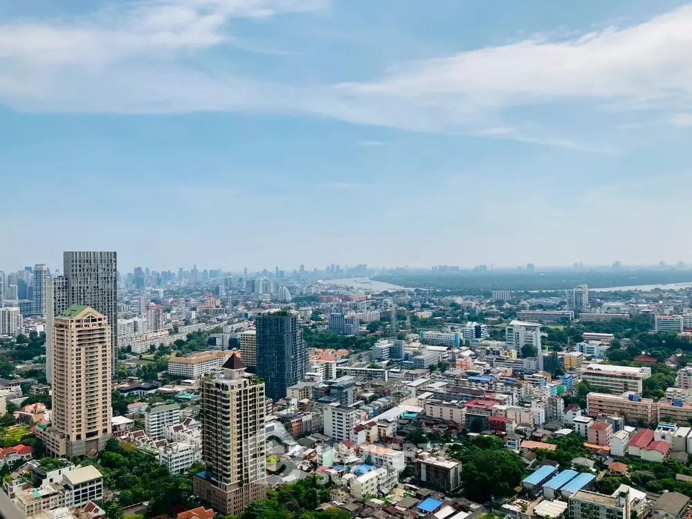 Stunning cityscape view showcasing modern skyline and lush greenery