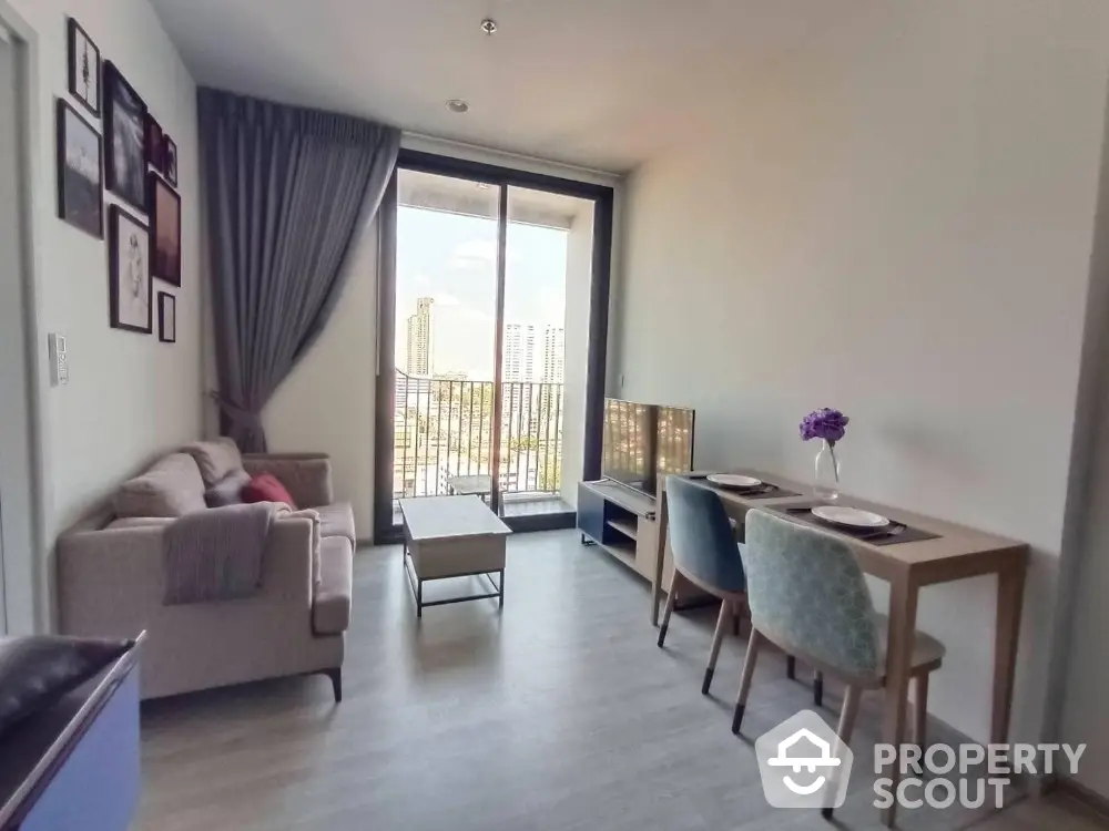 Modern living room with balcony view in high-rise apartment