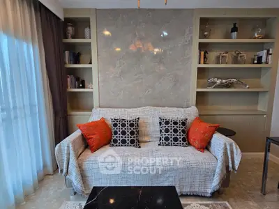 Elegant living room with stylish sofa and decorative shelves