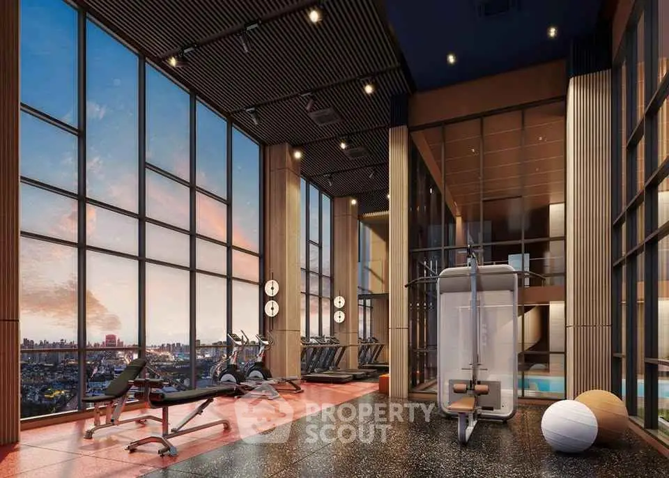 Luxurious high-rise gym with panoramic city views and modern fitness equipment.