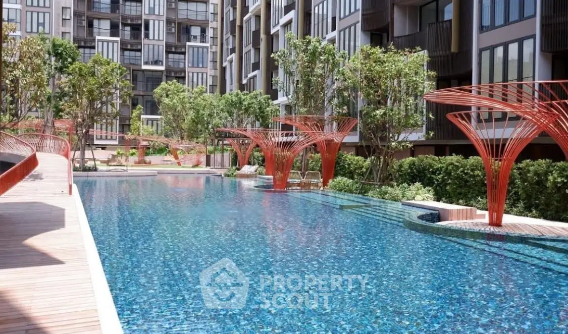 Luxurious condominium with stunning pool and modern architecture