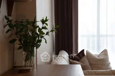 Cozy living room with modern decor and natural light