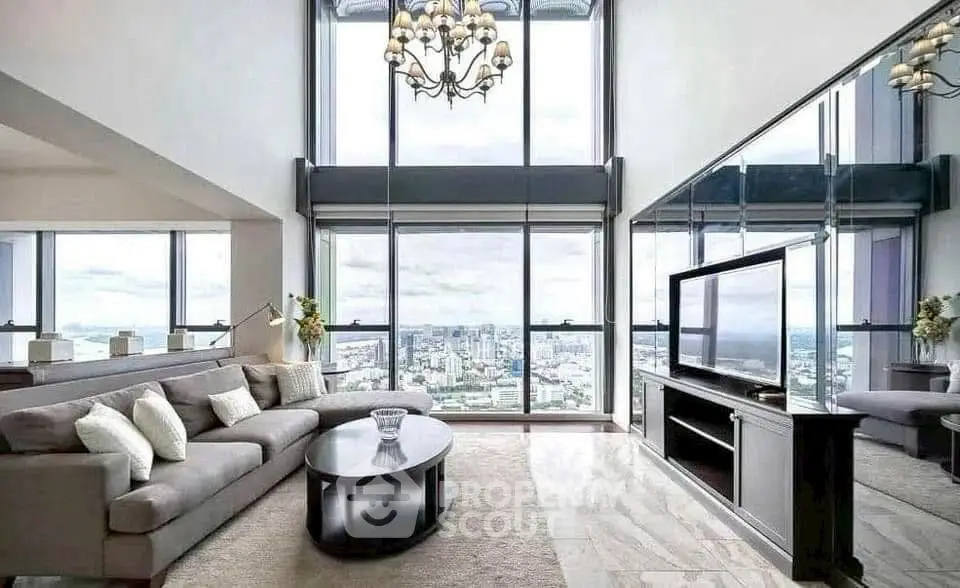 Luxurious high-rise living room with panoramic city views and elegant decor.