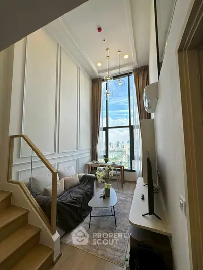 Modern living room with high ceiling and city view, featuring elegant decor and natural light.