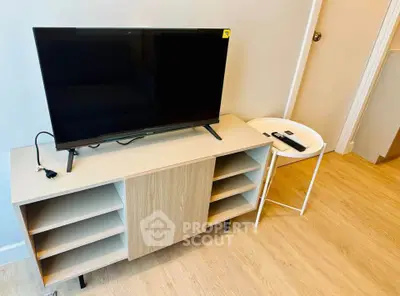 Modern living room with sleek TV stand and minimalist decor