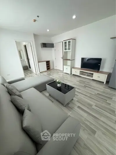 Modern living room with sleek furniture and stylish decor