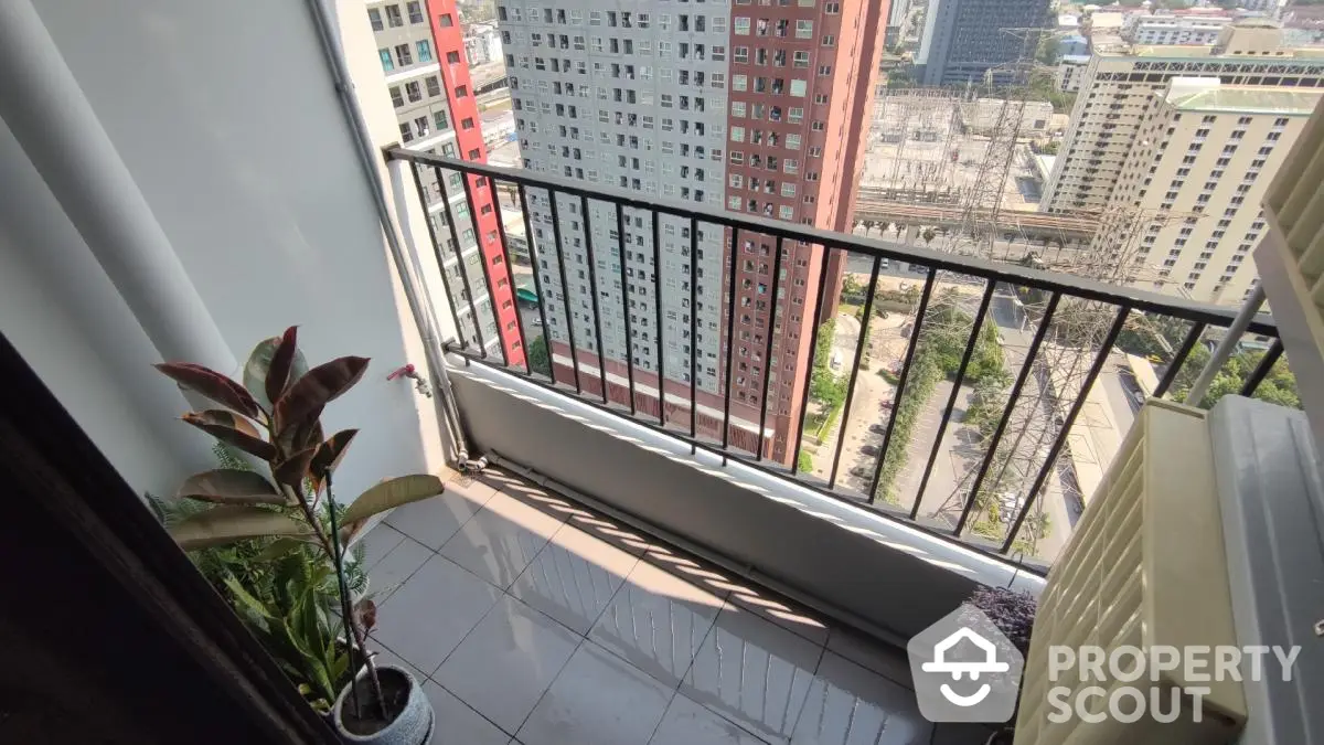 Modern balcony with city view in high-rise apartment