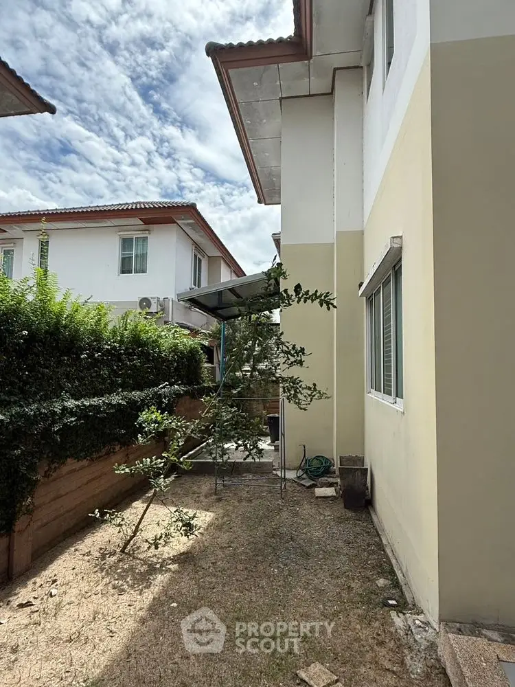 Charming suburban house with lush garden and modern architecture