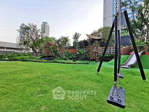 Spacious urban playground with lush greenery and modern play equipment, perfect for family-friendly living.