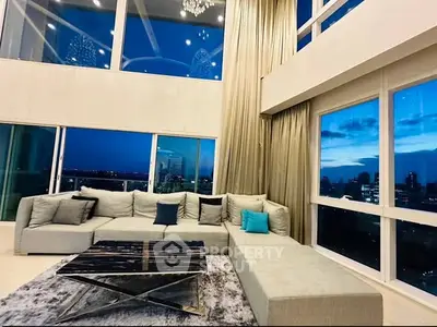 Luxurious living room with panoramic city view and elegant decor