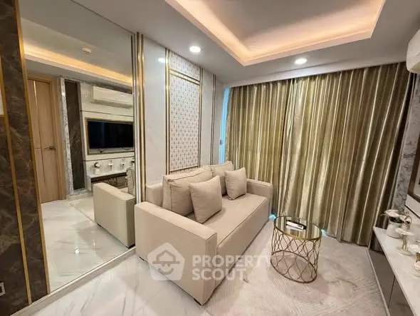 Luxurious modern living room with elegant decor and plush sofa in a high-end apartment.