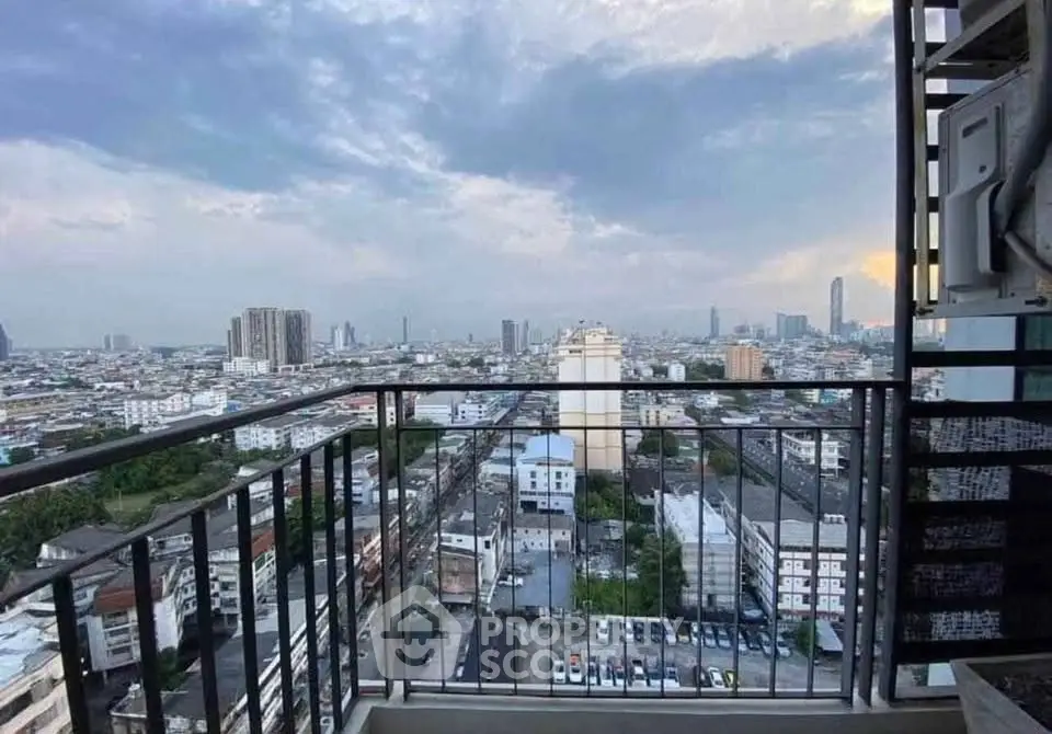Stunning cityscape view from a high-rise balcony, perfect for urban living enthusiasts.