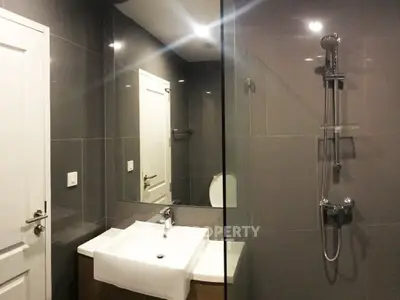 Modern bathroom with sleek design and glass shower enclosure