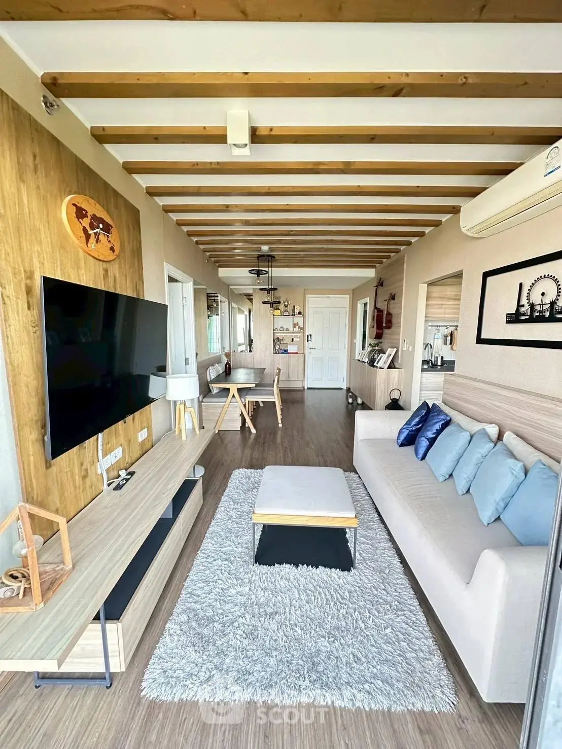Stylish modern living room with wooden accents and cozy seating area