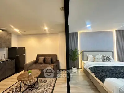 Modern studio apartment with cozy living area and stylish bedroom