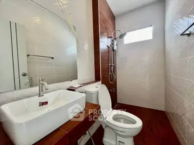 Modern bathroom with sleek fixtures and stylish tile design