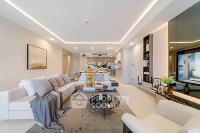 Luxurious modern living room with elegant decor and open kitchen layout