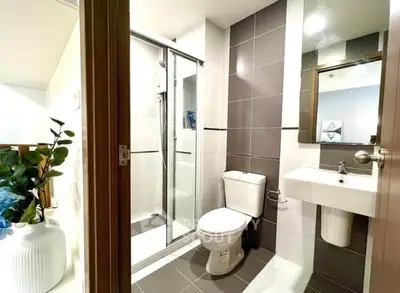 Modern bathroom with sleek design and glass shower enclosure