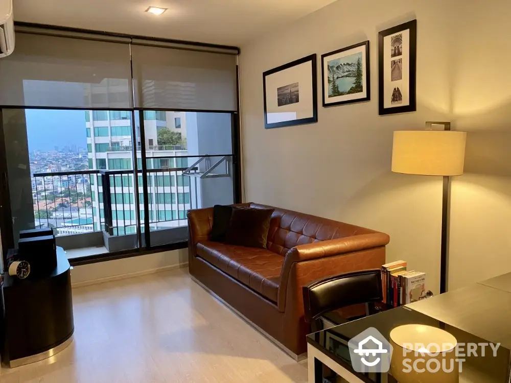 Modern living room with leather sofa and city view balcony