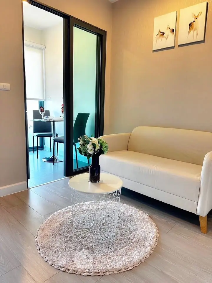 Chic modern living room with cozy seating and stylish decor, perfect for urban living.