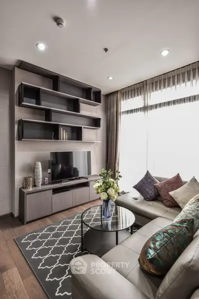 Modern living room with stylish shelving and cozy seating area