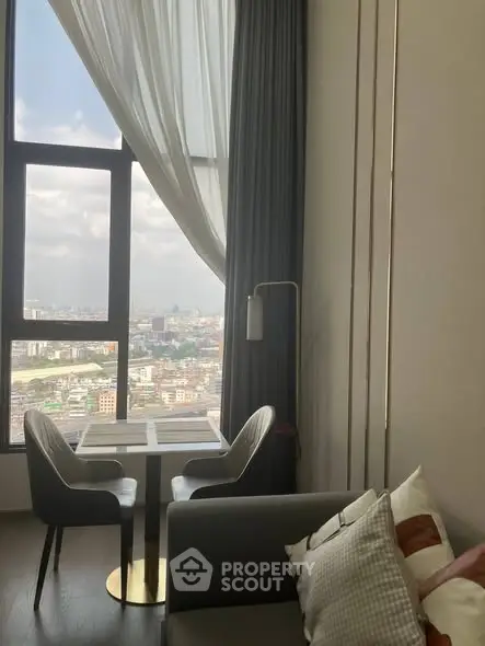 Modern living room with panoramic city view and elegant decor