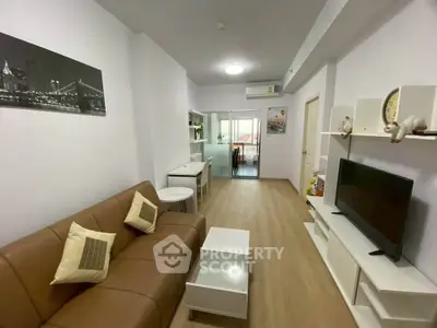Modern living room with sleek furniture and stylish decor in a cozy apartment.