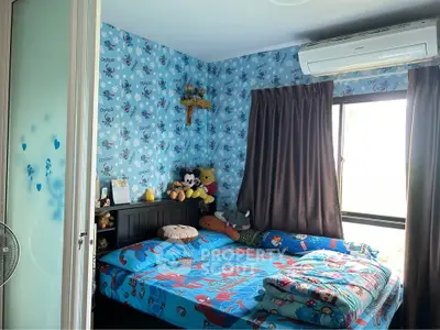 Charming bedroom with playful decor and natural light, perfect for a child's retreat.