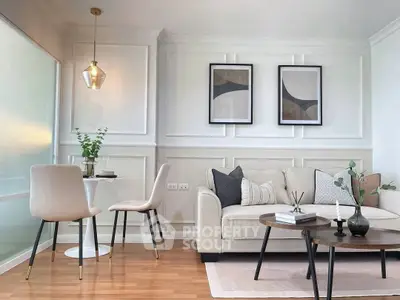 Stylish modern living room with elegant decor and cozy seating area.