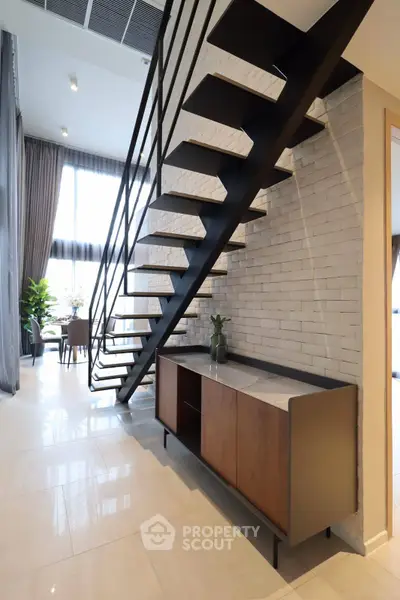 Modern duplex interior with stylish staircase and elegant decor
