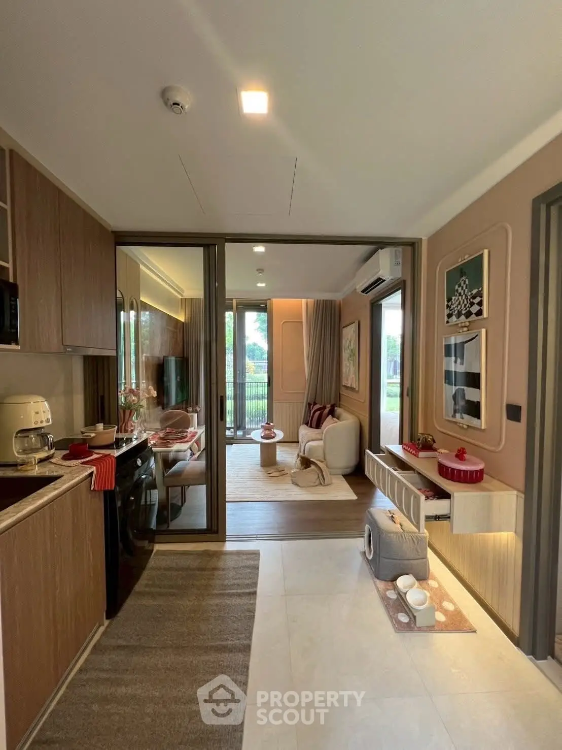 Modern open-layout living room with stylish decor and garden view