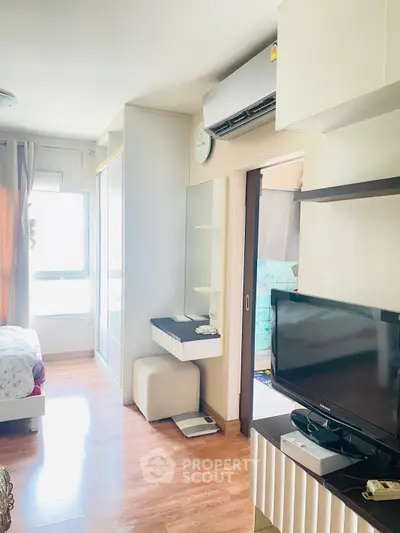 Bright and cozy bedroom with modern furnishings and natural light