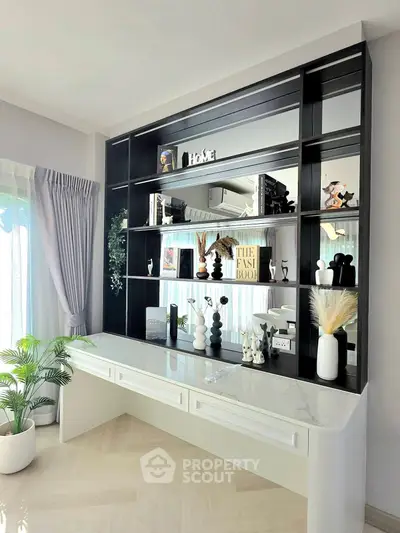 Stylish modern living room with elegant shelving and decor accents