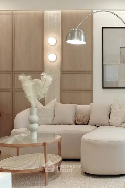 Elegant living room with modern decor and cozy seating area