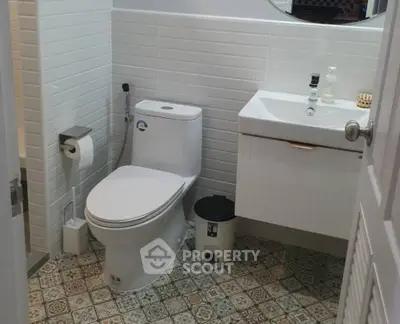 Modern bathroom with stylish tiles and sleek fixtures