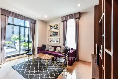 Stylish living room with modern decor and large windows for natural light