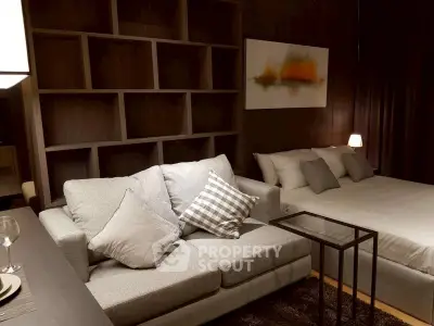 Modern studio apartment with cozy living area and stylish decor