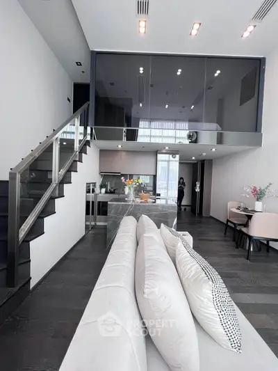 Modern loft apartment with sleek kitchen and stylish living area