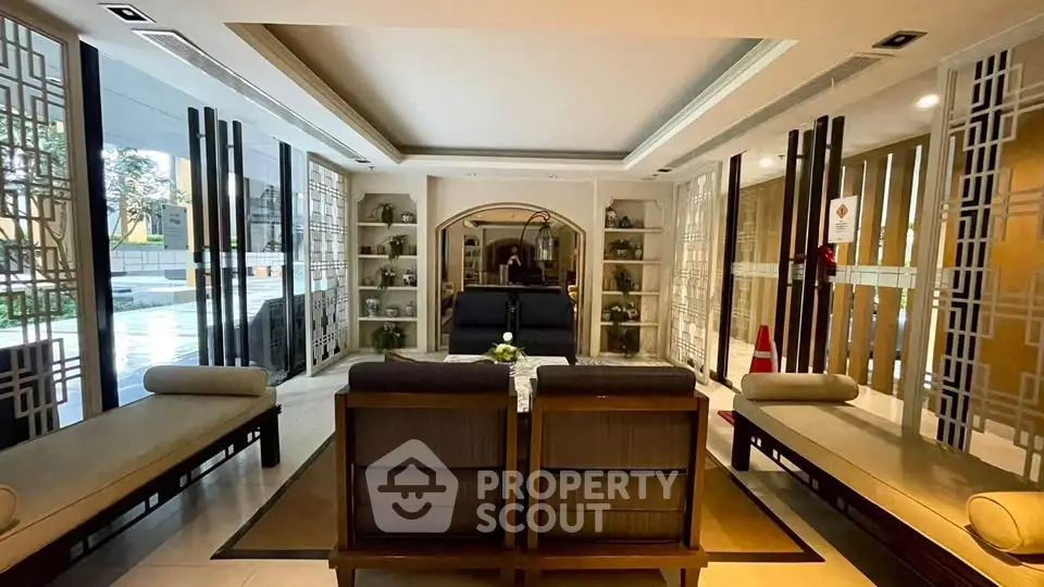 Luxurious lobby with elegant seating and modern decor in upscale building