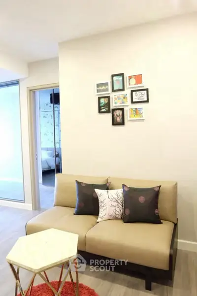 Cozy living room with modern sofa and decorative wall art