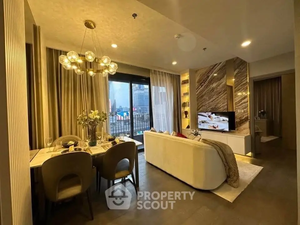Luxurious modern living room with elegant dining area and city view balcony.