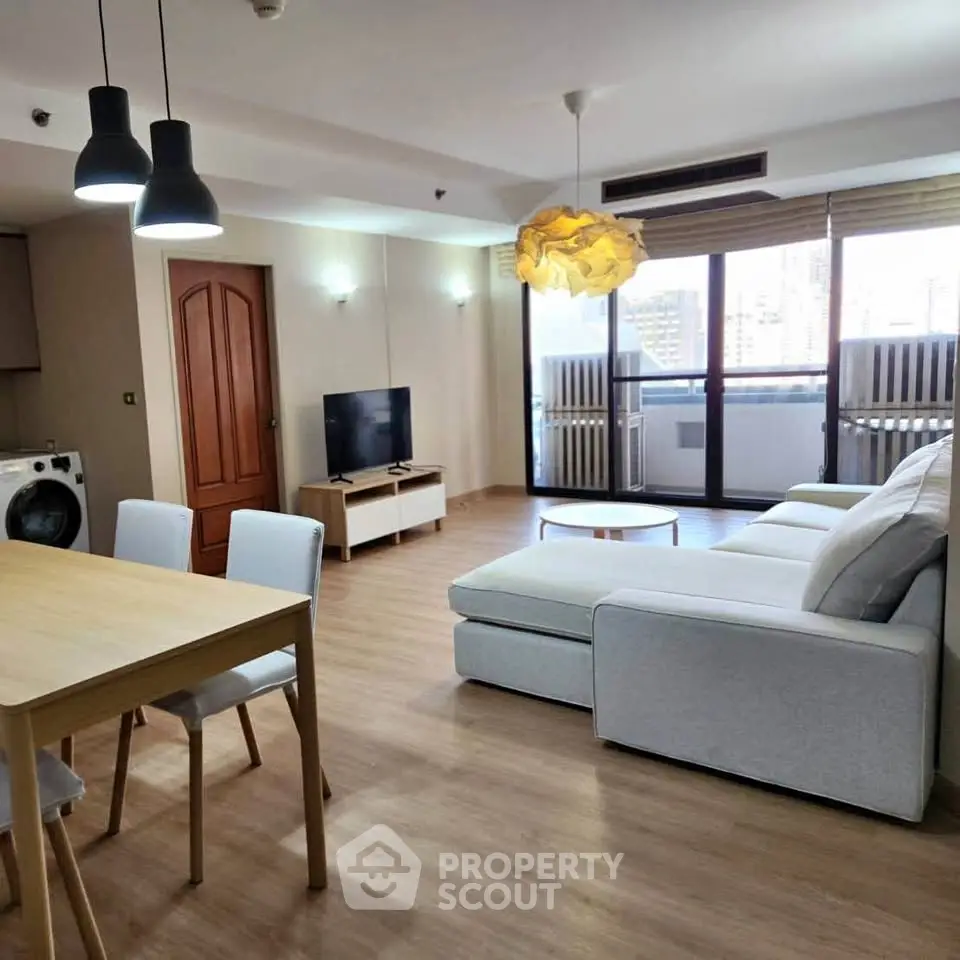 Spacious modern living room with stylish furniture and natural light