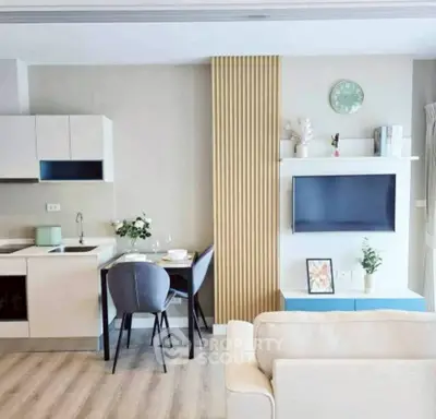 Modern living room with open kitchen and stylish decor