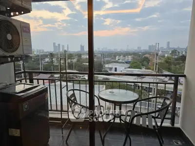 Stunning balcony view with city skyline, perfect for relaxation and enjoying sunsets.