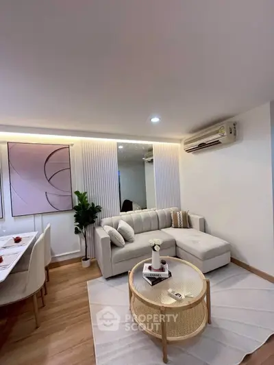 Stylish modern living room with elegant decor and cozy seating area