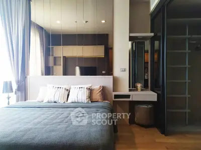 Modern bedroom with stylish decor and ample storage space