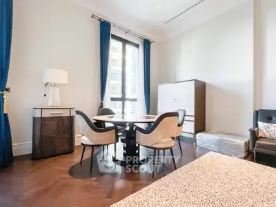 Elegant living room with modern furniture and large window in luxury apartment